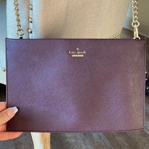 Burgundy/purple Kate Spade clutch with gold chain